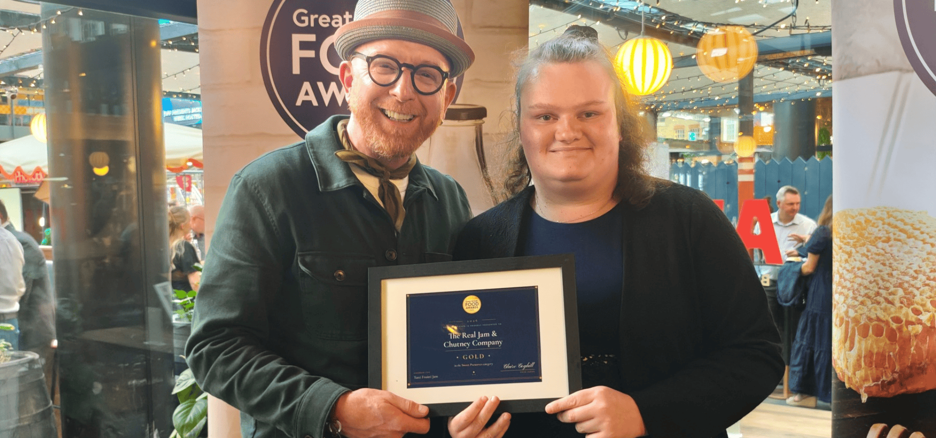 Neuro disabled cook, Chelsea, recieving Great British Food award from Chef Paul A Young.